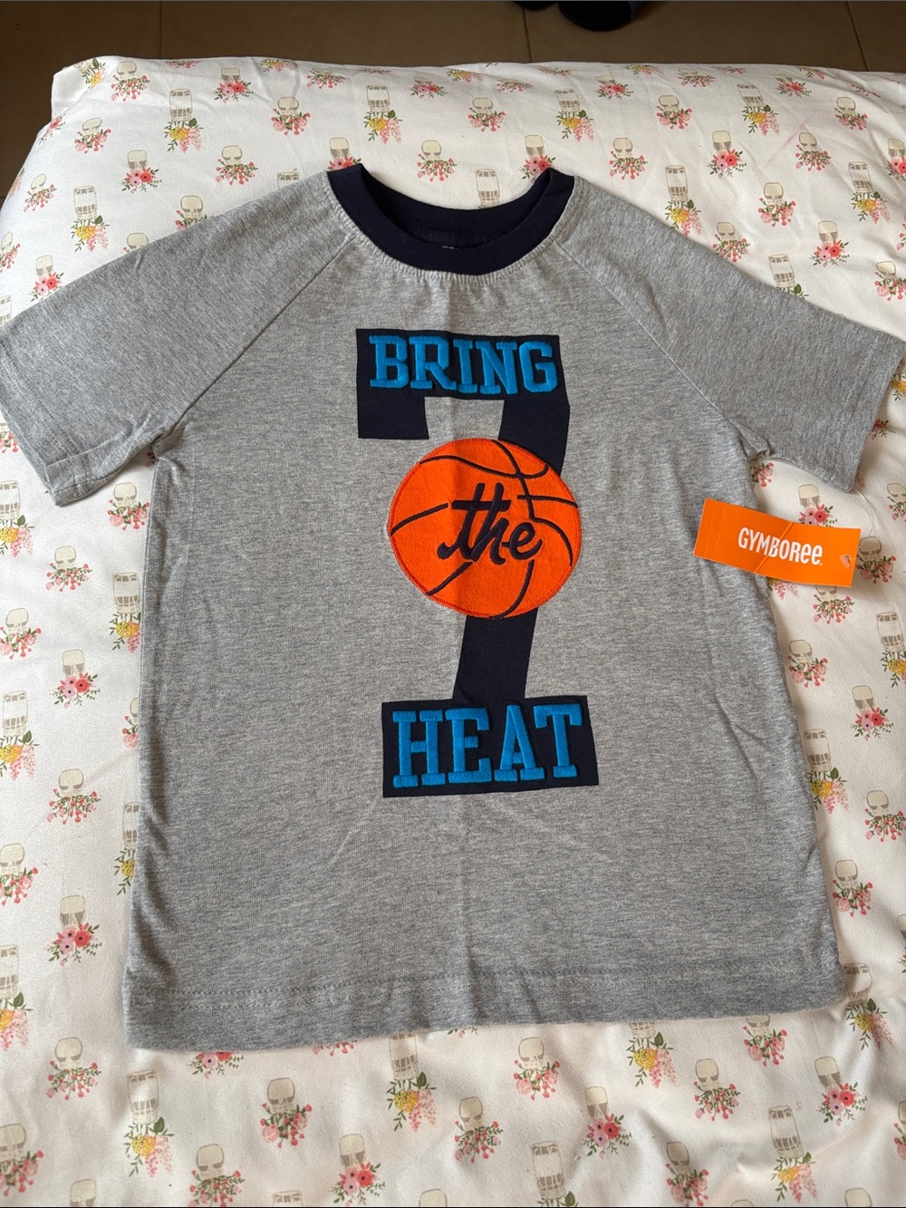 Gymboree Grey Tee with Orange Basketball and Blue Lettering, size Small.